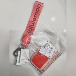 Sold! NWT LULULEMON NEVER LOST and ID CARD CASE in raspberry cream / wine berry
